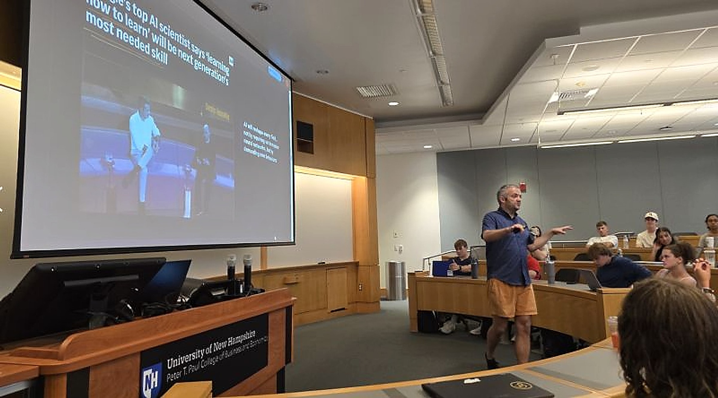 Leading a practical AI session in a University of New Hampshire lecture hall